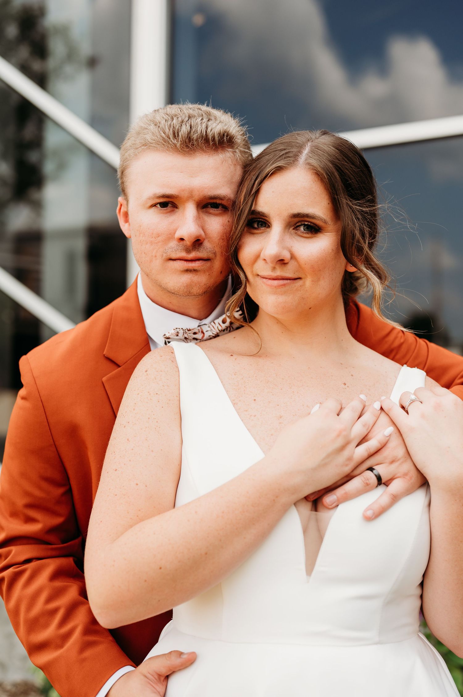 bride & groom outside church in cedar falls iowa. taken by cedar falls des moines area photographer. image by midwest photographer