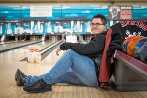 boy senior pictures bowling alley