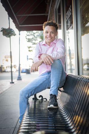 boys senior pictures on bench