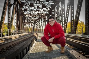 boys senior pictures on bridge
