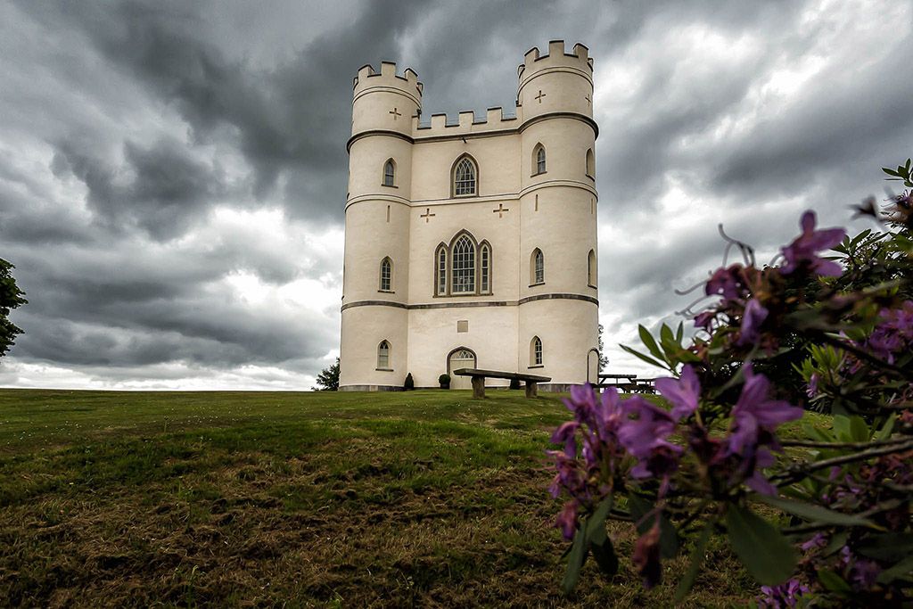 Small white Castle on top of hill near Exeter Wedding Photographer Devon