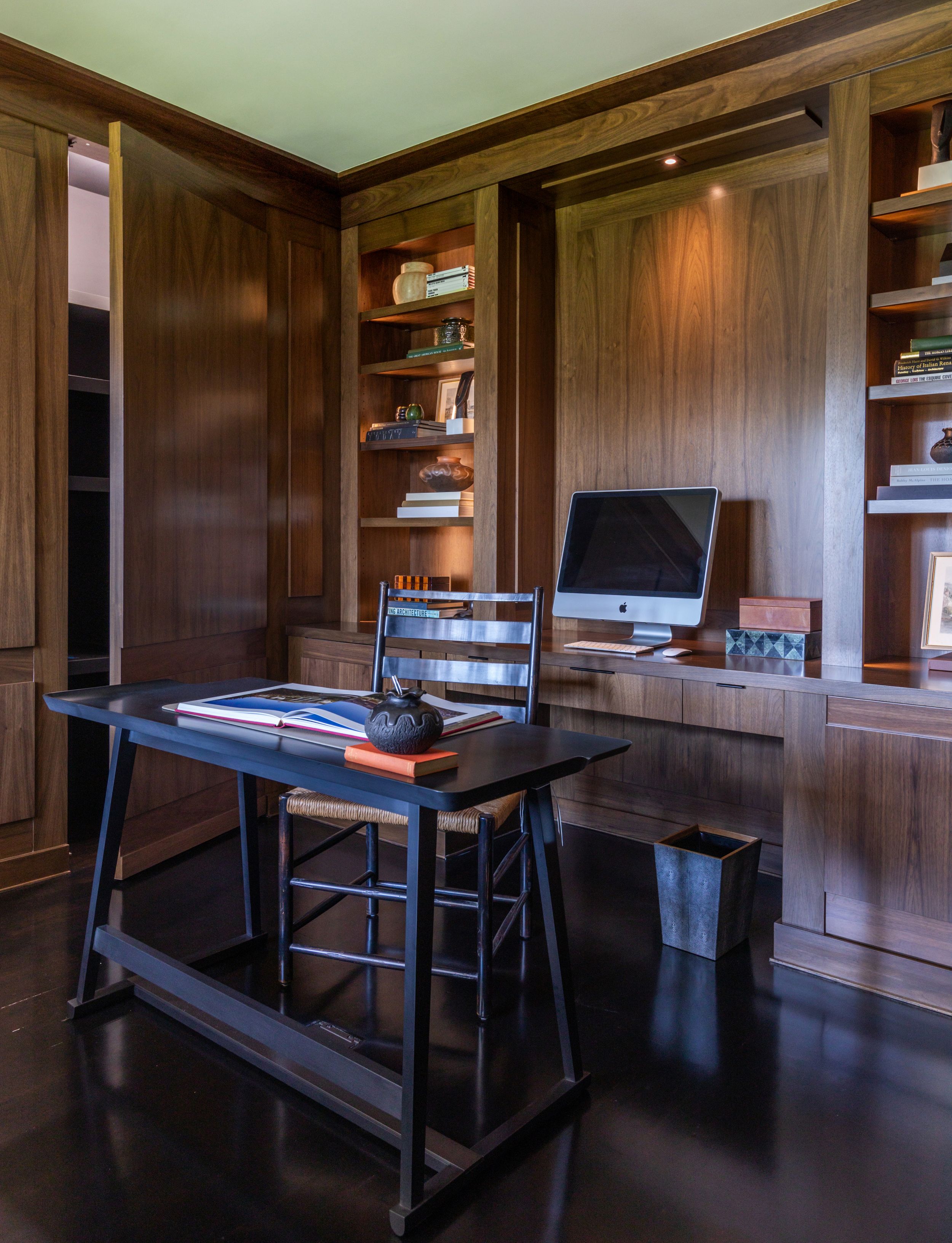 Custom designed office with Walnut interior paneling by Orangerie Home