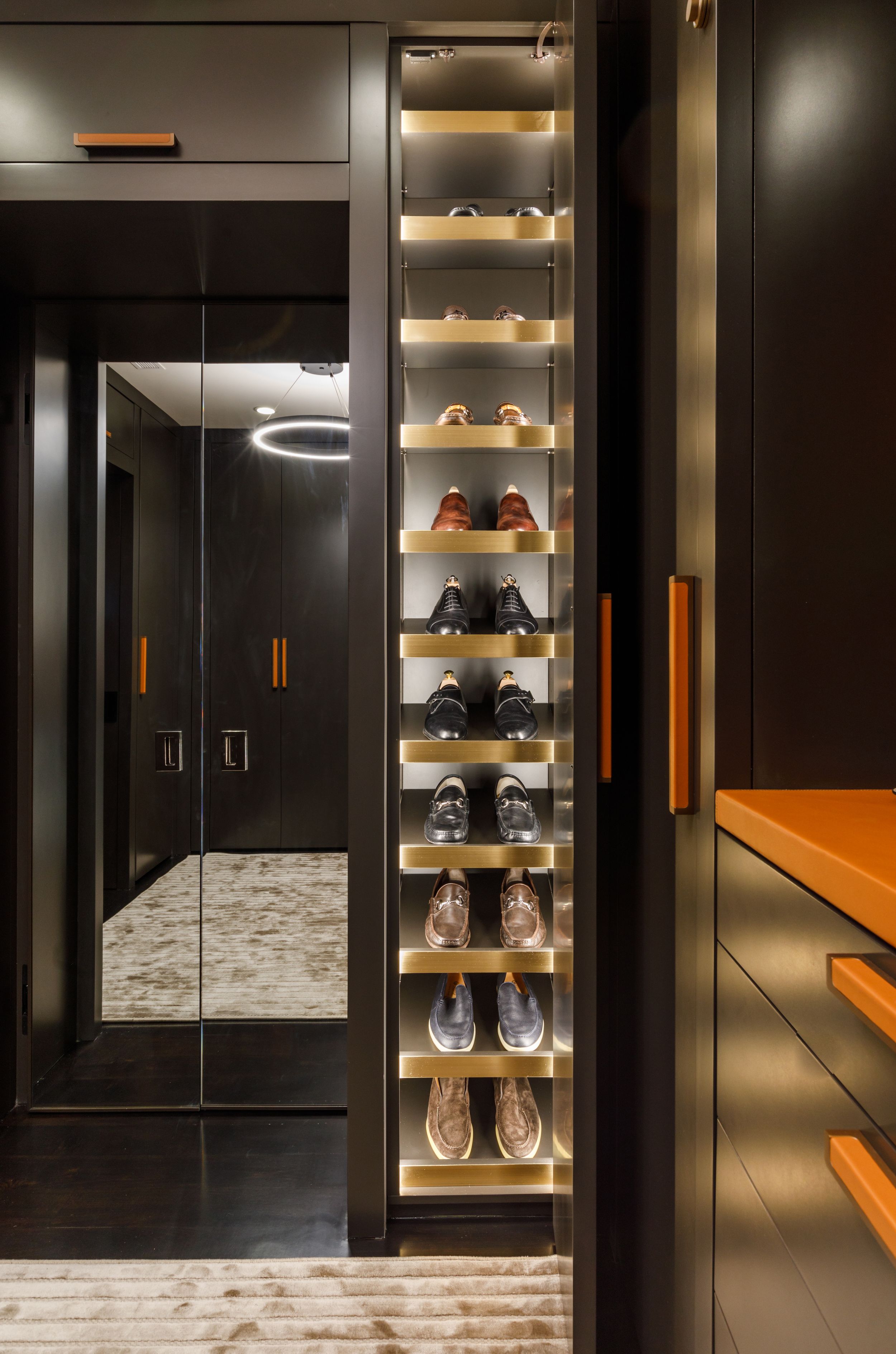 Shoe orangization in luxury men's closet by Orangerie Home
