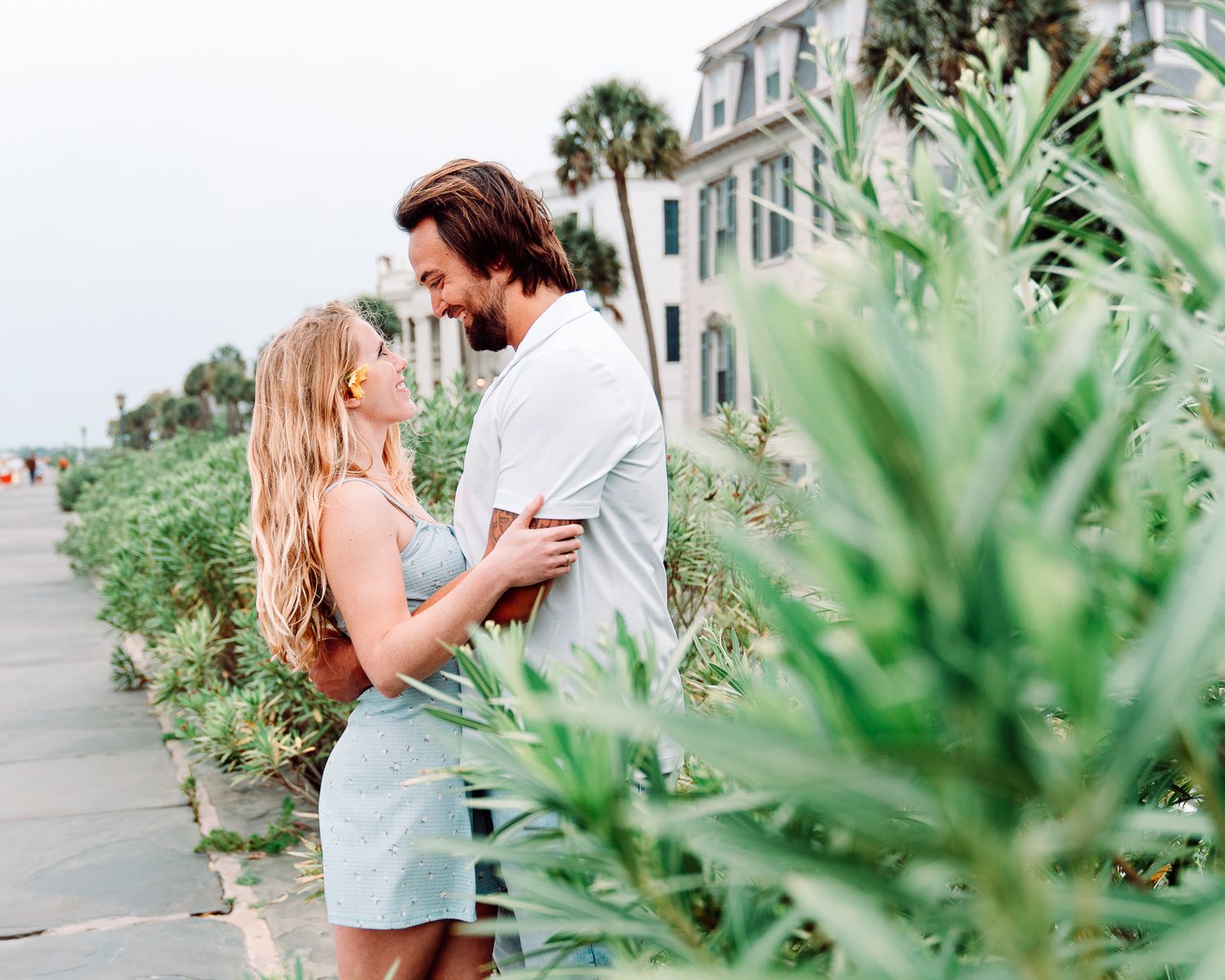 Couple kissing and lauging at the battery in charleston south carolina, photo by PHV Photo