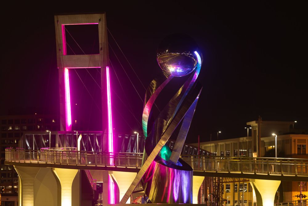 Solidarity sculpture by Hunter Brown at night
