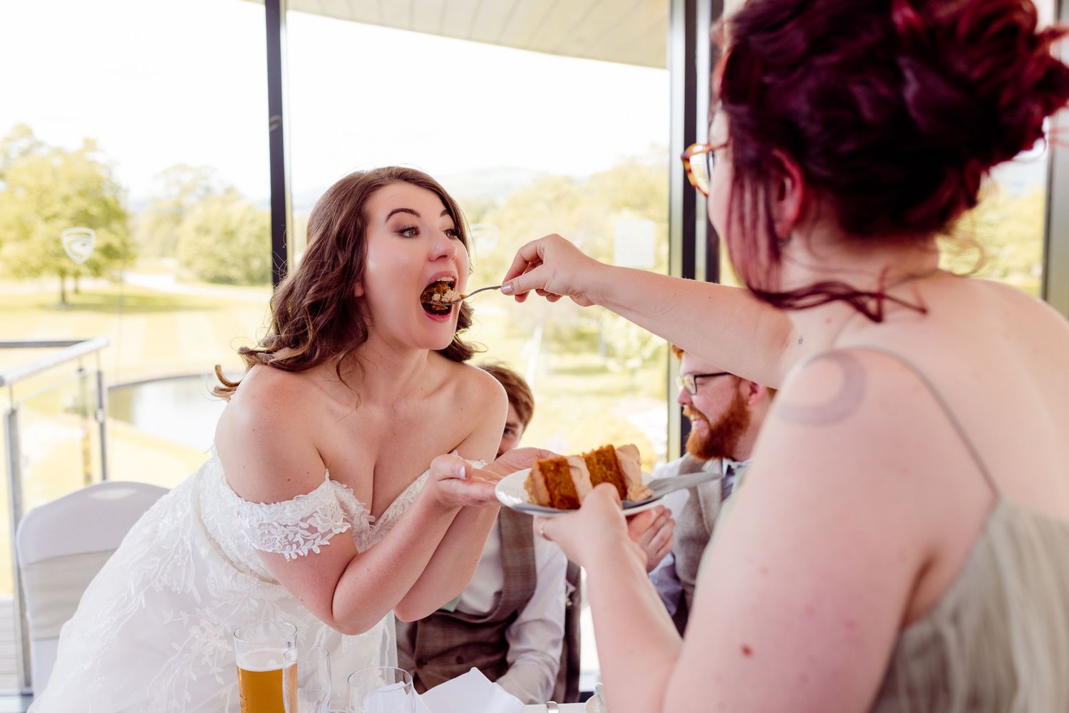 Wedding party enjoying snacks during pre-ceremony preparations.
