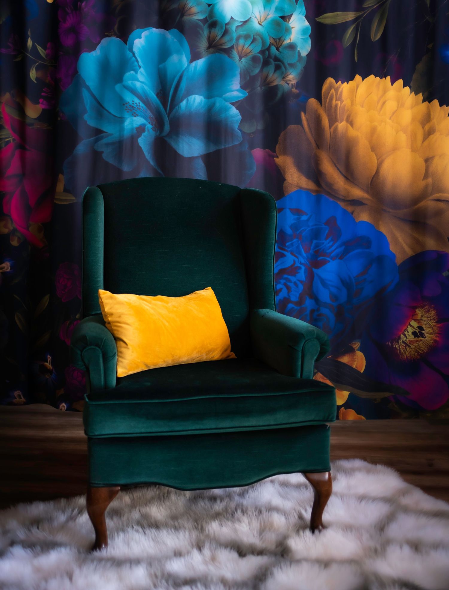 green chair with a flower society 6 backdrop