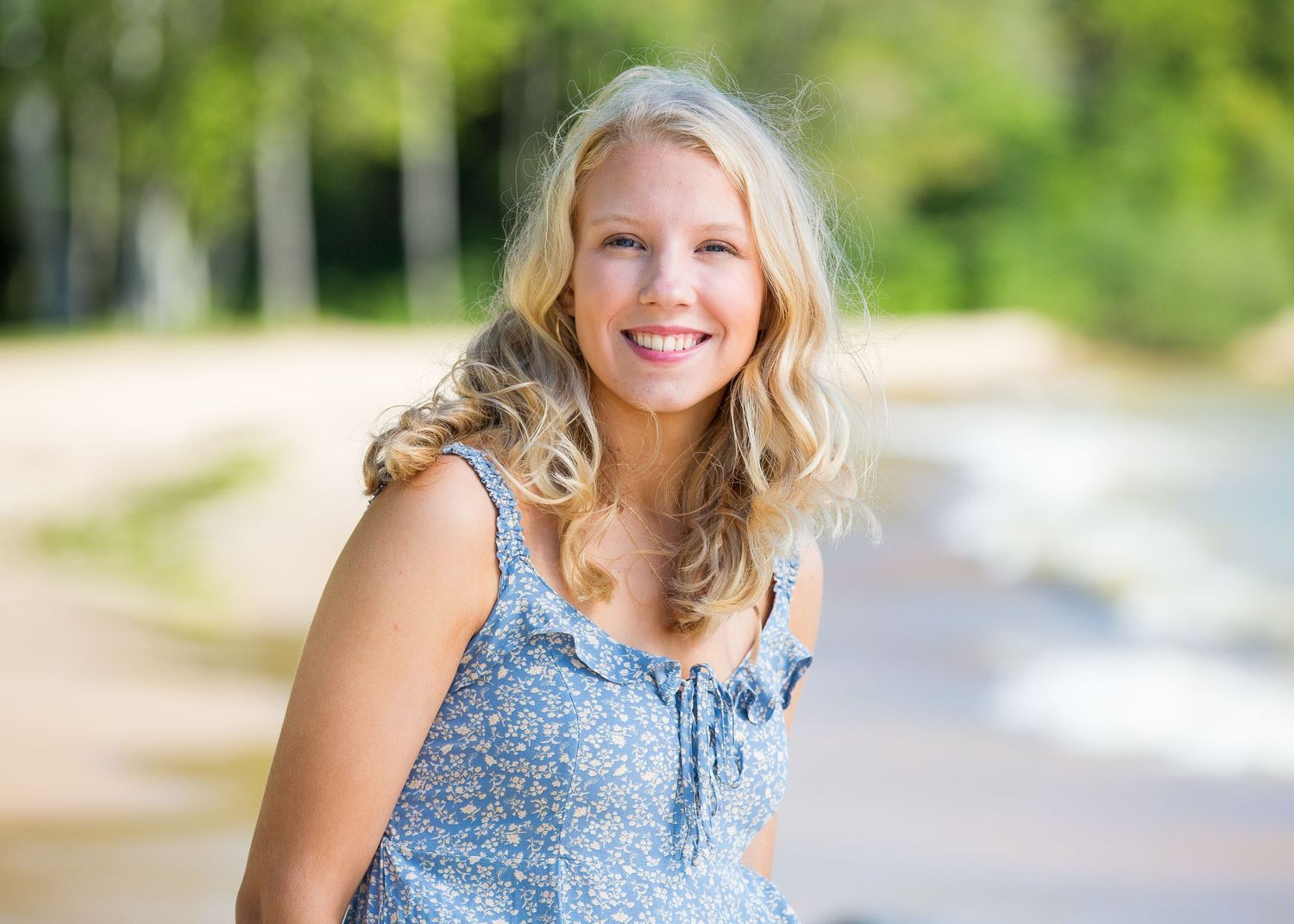 High School female senior photography. Smiling at camera. Beverly Hills, MI