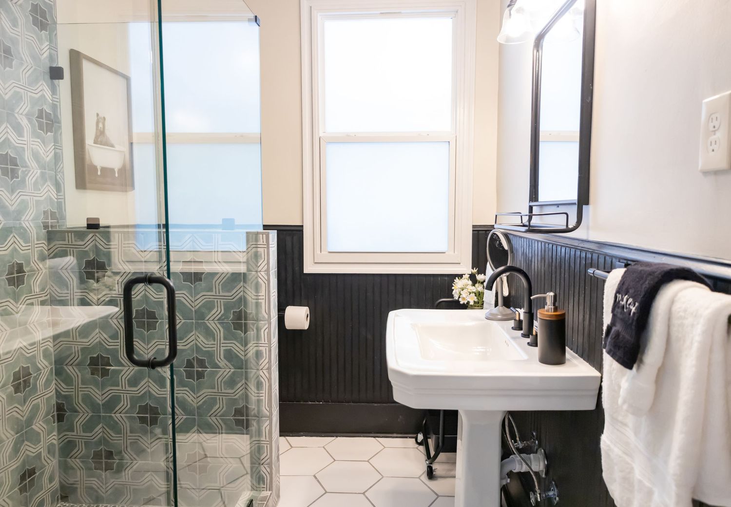 Modern bathroom showcasing new appliances and sink.