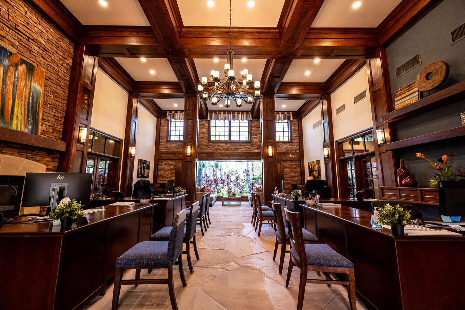 Elegant and Inviting Lobby Space with Wood-Style Design at Lodge at Lakecrest Multifamily Community in Tampa
