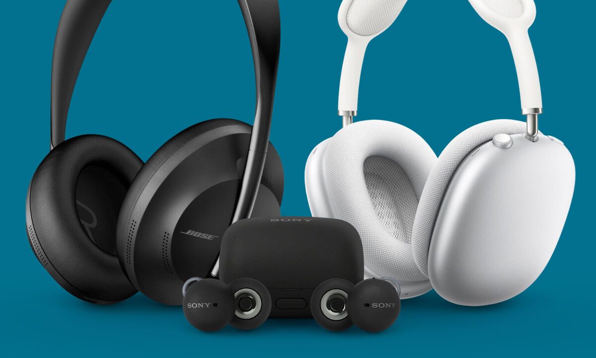 Modern black and white wireless headphones with charging case on turquoise background.