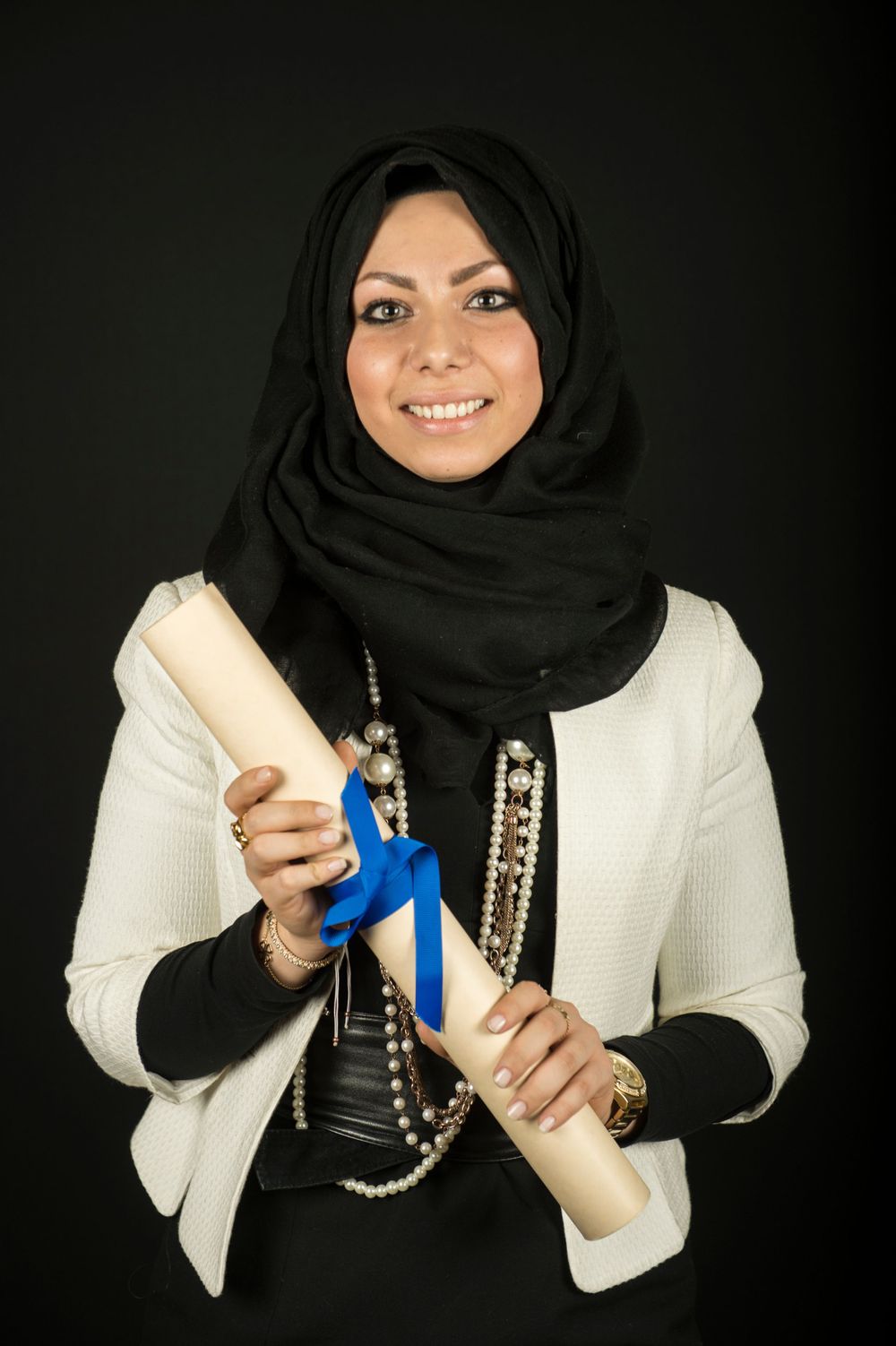 charterholder portrait of a woman against a black background