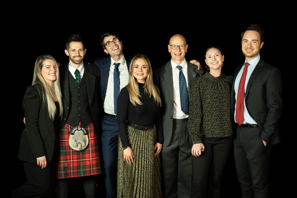 Portable studio with panoramic black background winner portraits at merchant Taylors hall