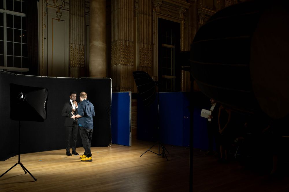 Portable studio with panoramic black background winner portraits at one great George street