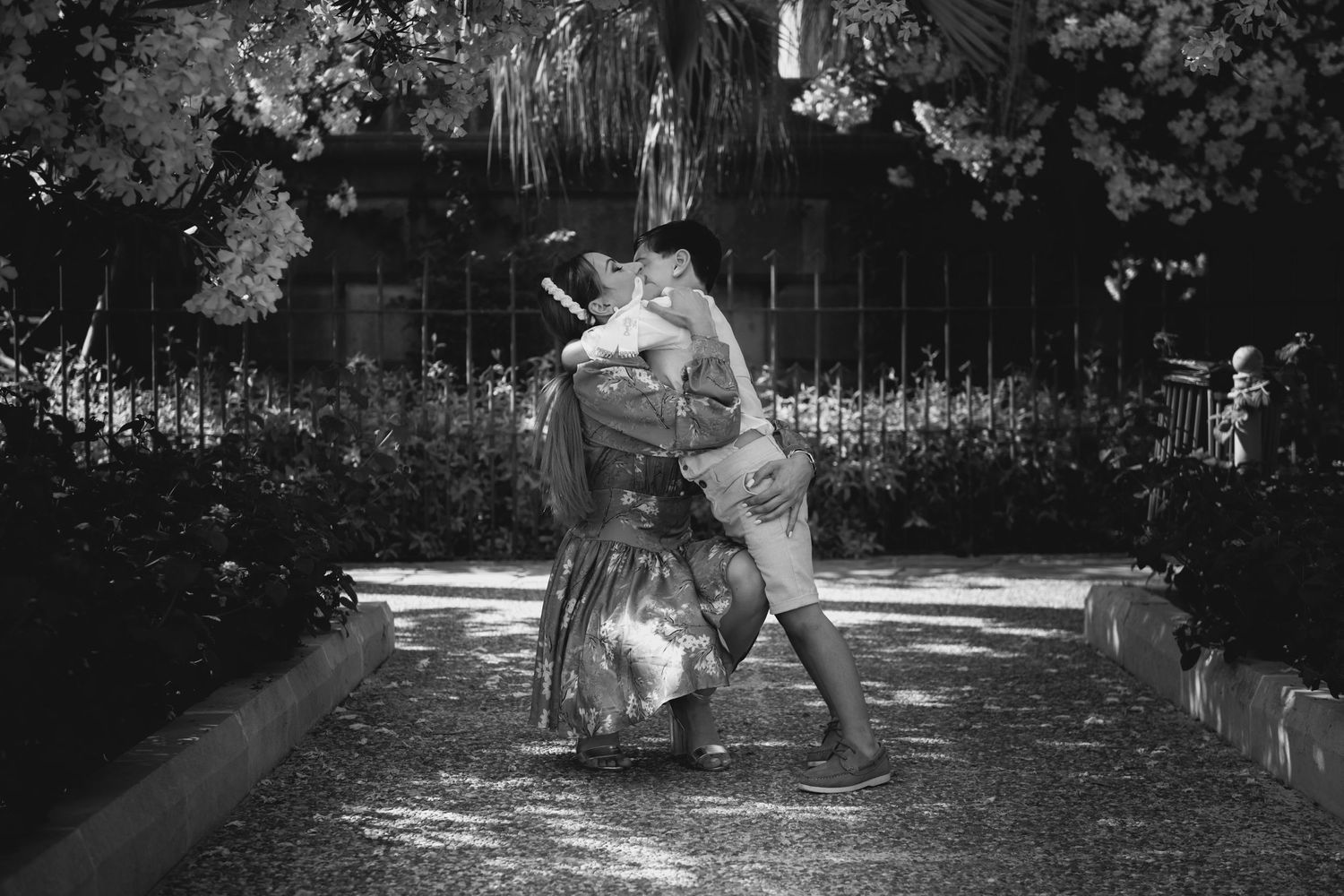Playful action shots in a garden setting with natural lighting.