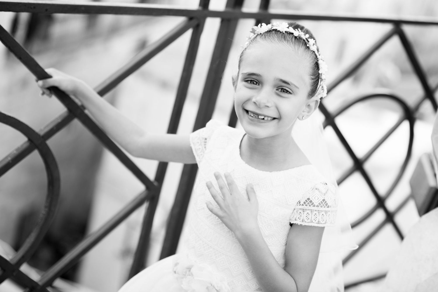 Close-up black and white portrait shots showing joyful expressions.