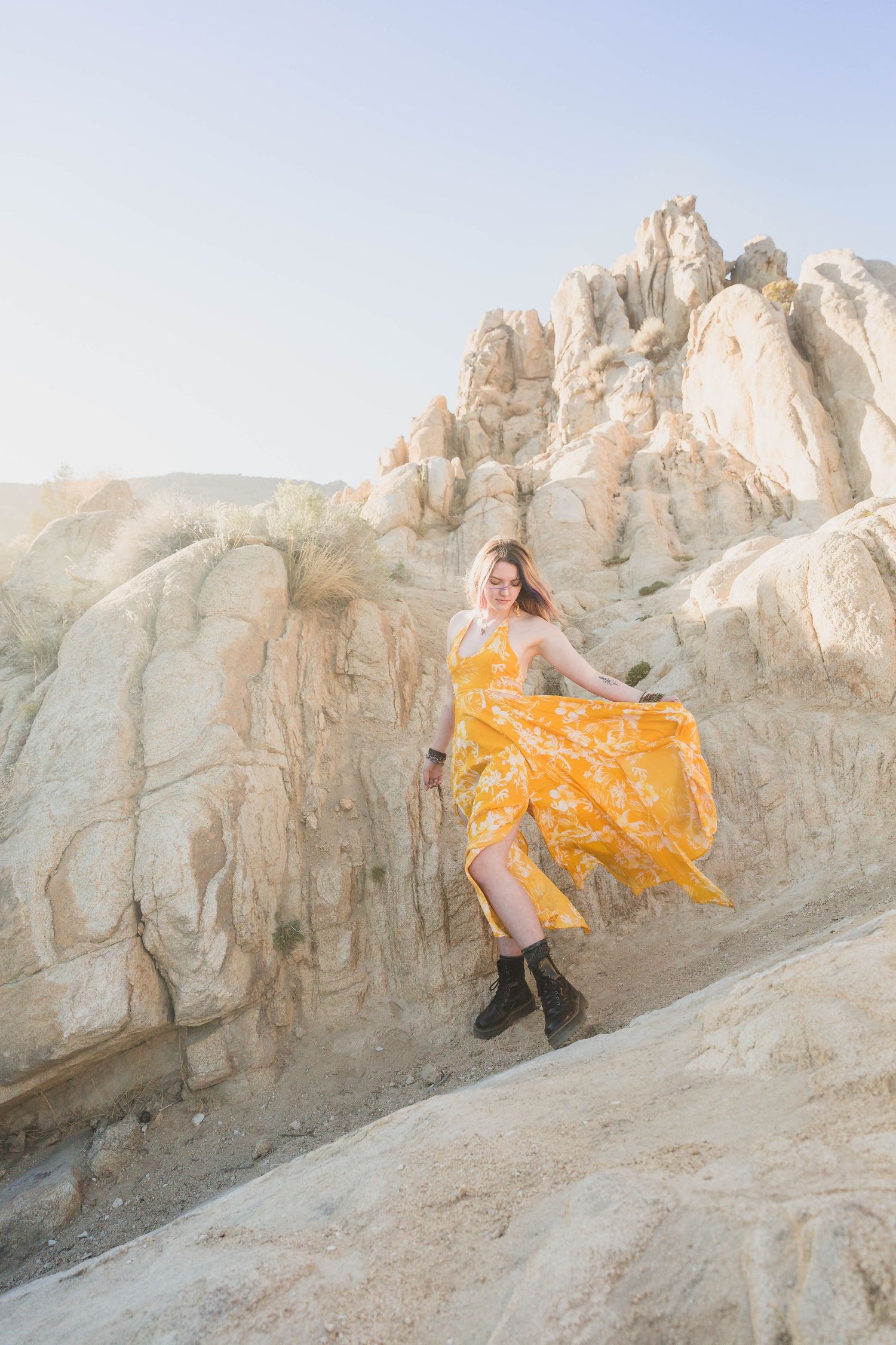 Moon Rocks Desert Nevada Senior Photo with pink and blue hair and yellow Free People Dress and Dr. Marten boots