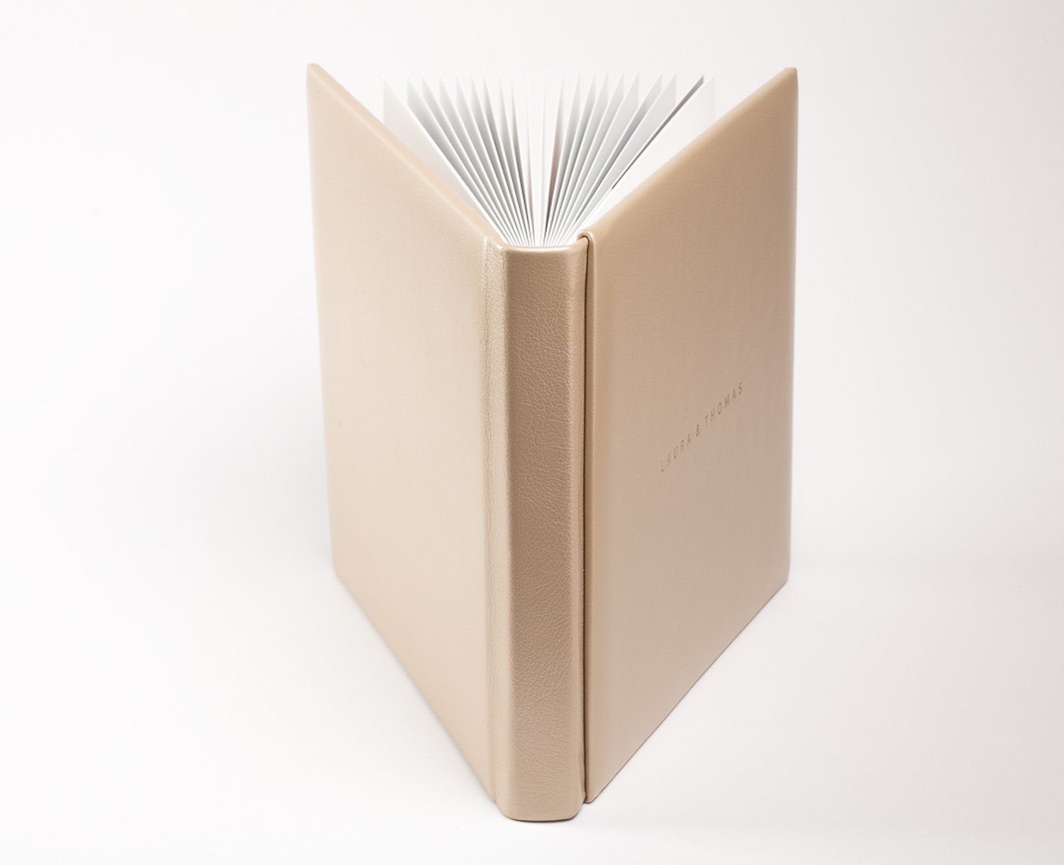 A clean, Minimal leather, engraved Wedding album at From Memory Studios, Bengaluru, India