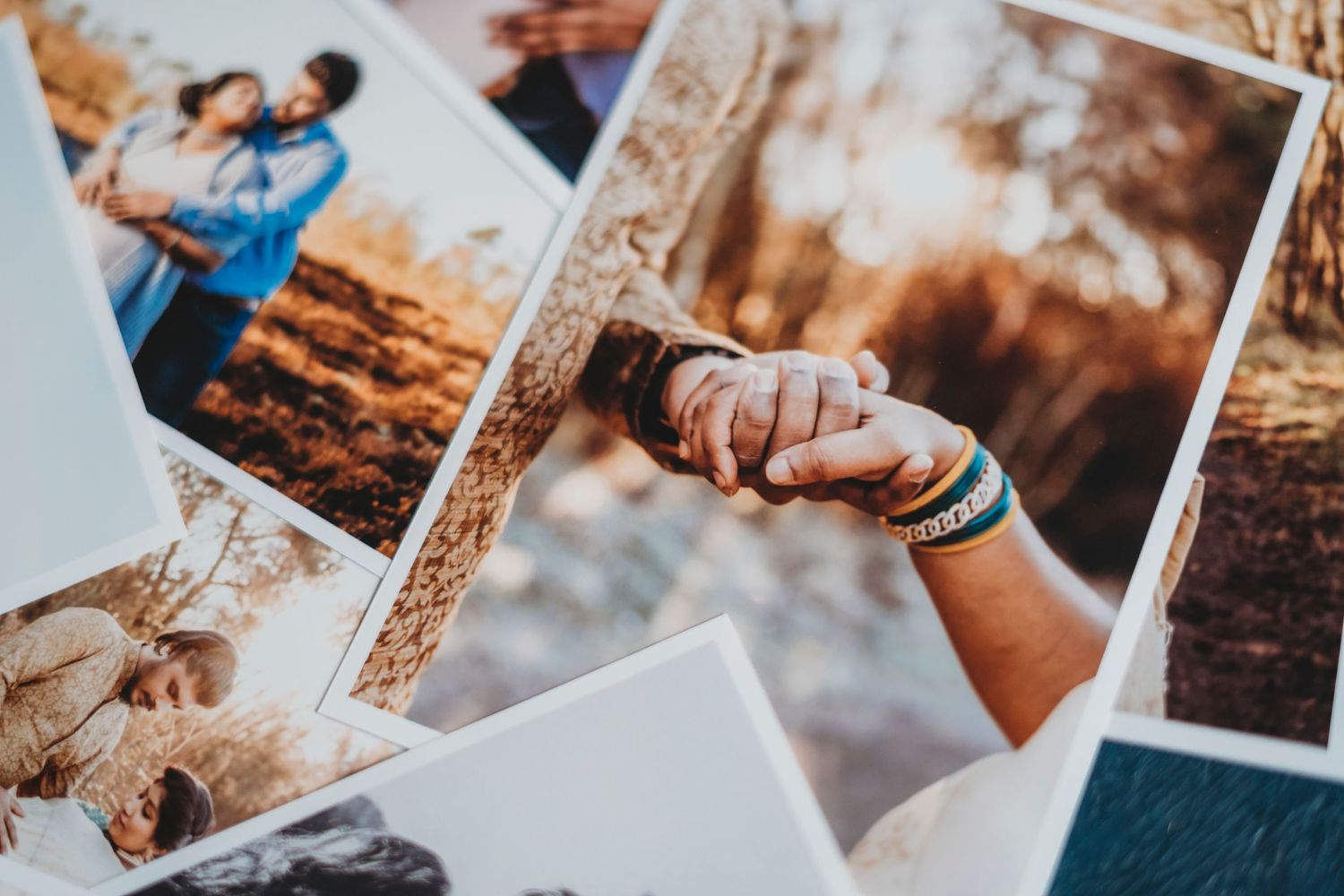 A collection of vintage-style photographs spread out showing moments of togetherness.