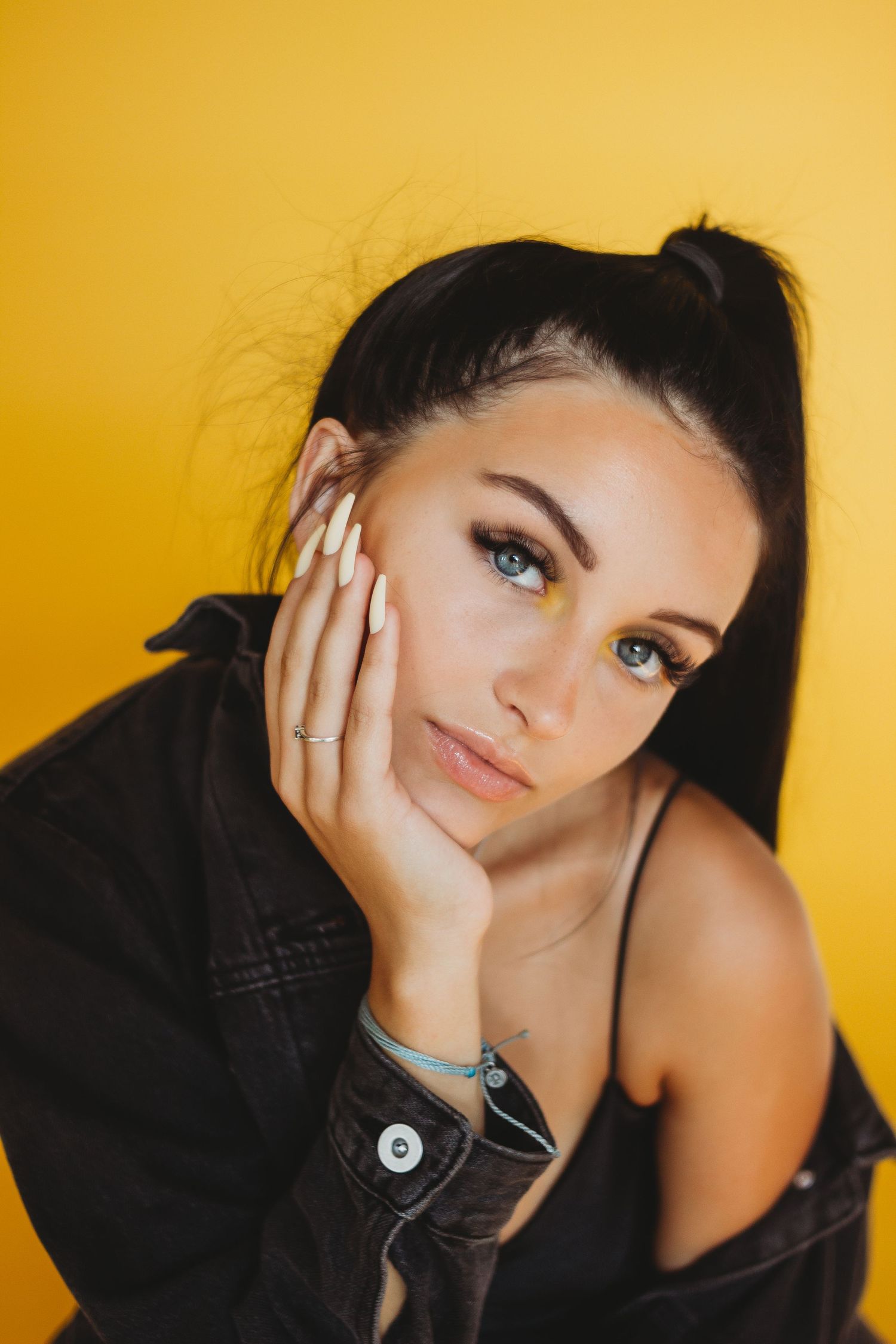 yellow background girl headshot