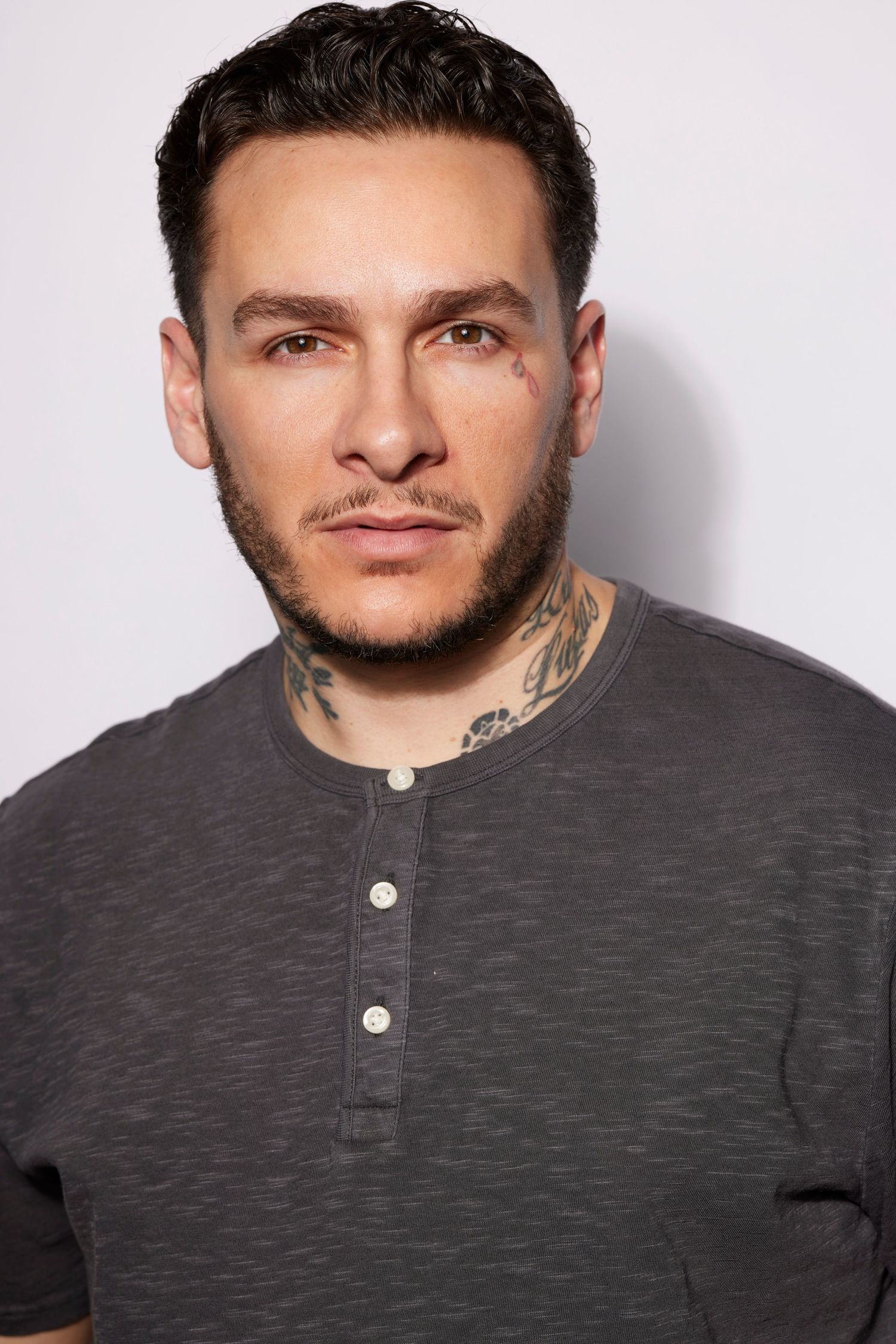 Engaging and intense headshot of a strong male actor