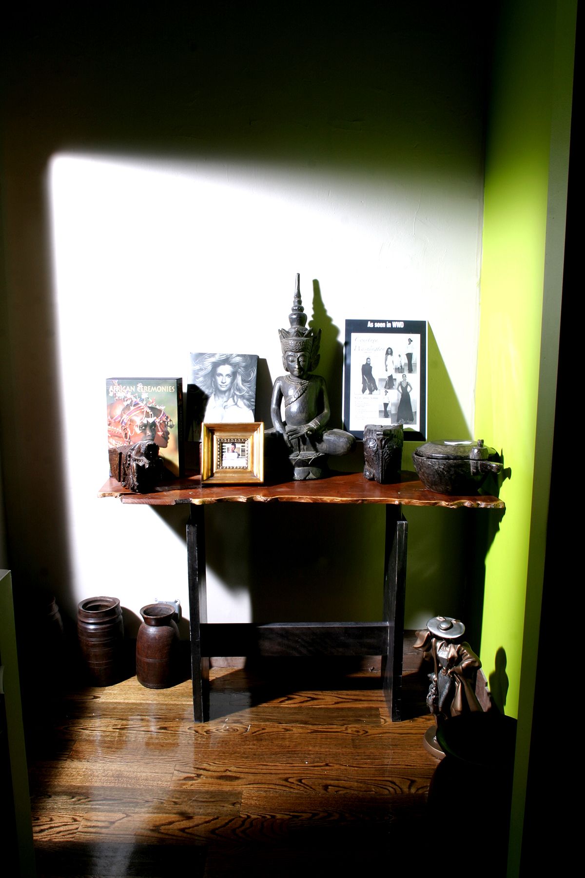 Table with Photographs and African hand made Bowls & Statue
