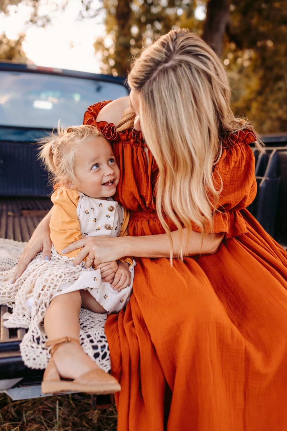 Family portraits in Mooresville NC with joyful candid moments
