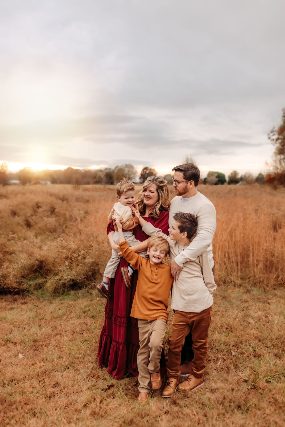 Family portraits in Mooresville NC with joyful candid moments