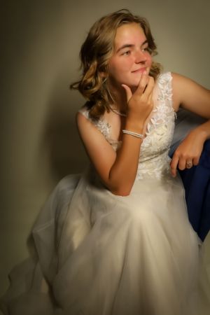 Intimate bridal portrait sequence with soft lighting and elegant dress details.