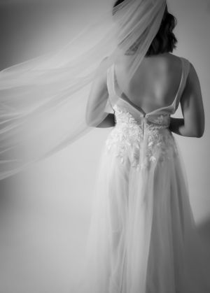 Dreamy black and white sequence capturing the movement of a flowing wedding dress and veil.
