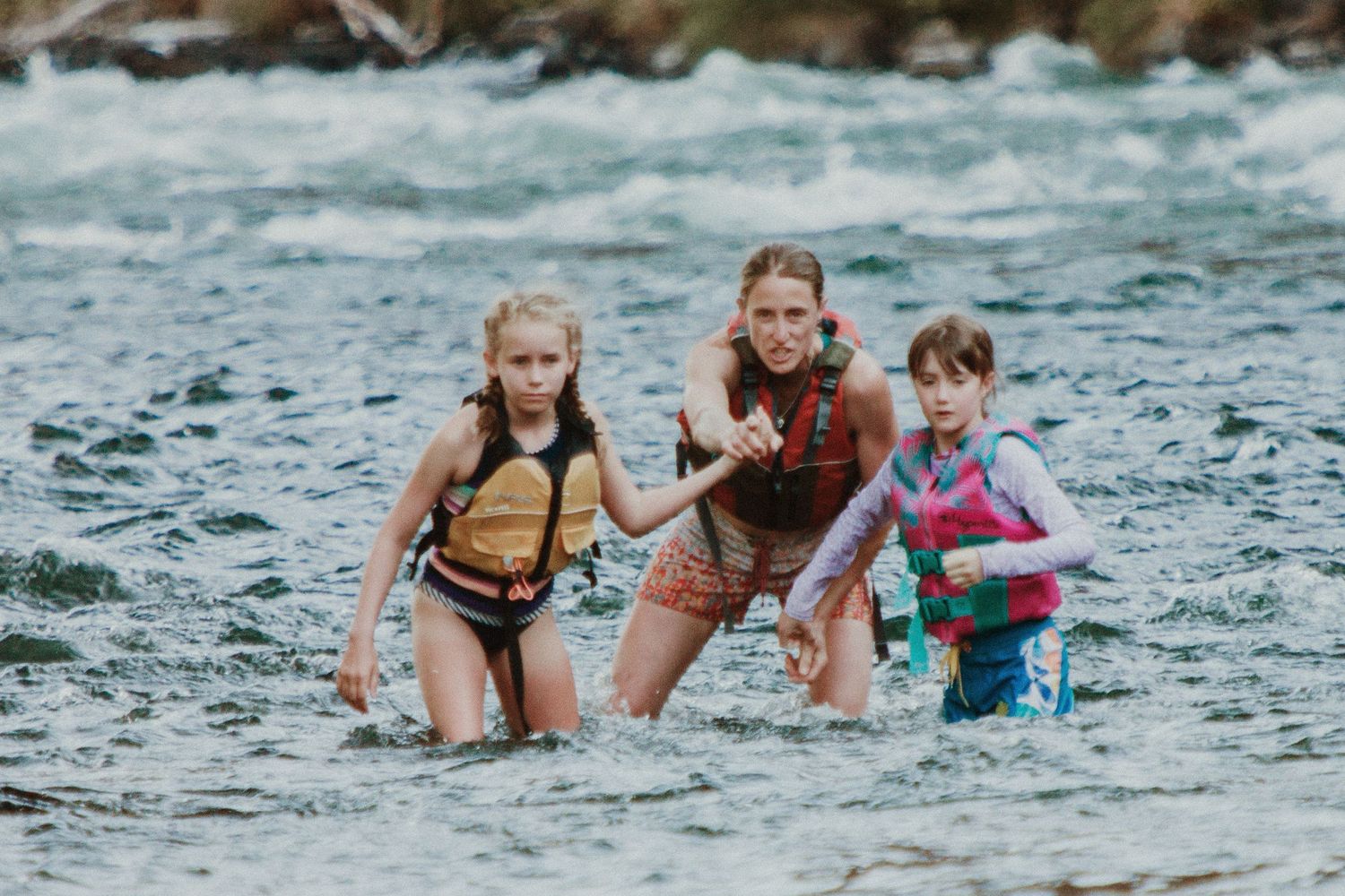 parent pointing out dangers looking down river