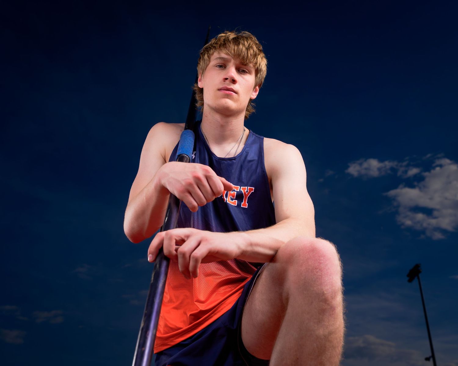 Hershey Trojans pole vaulter portrait on photo day, by Deanna Fox, SportsFox Photography, Hershey PA