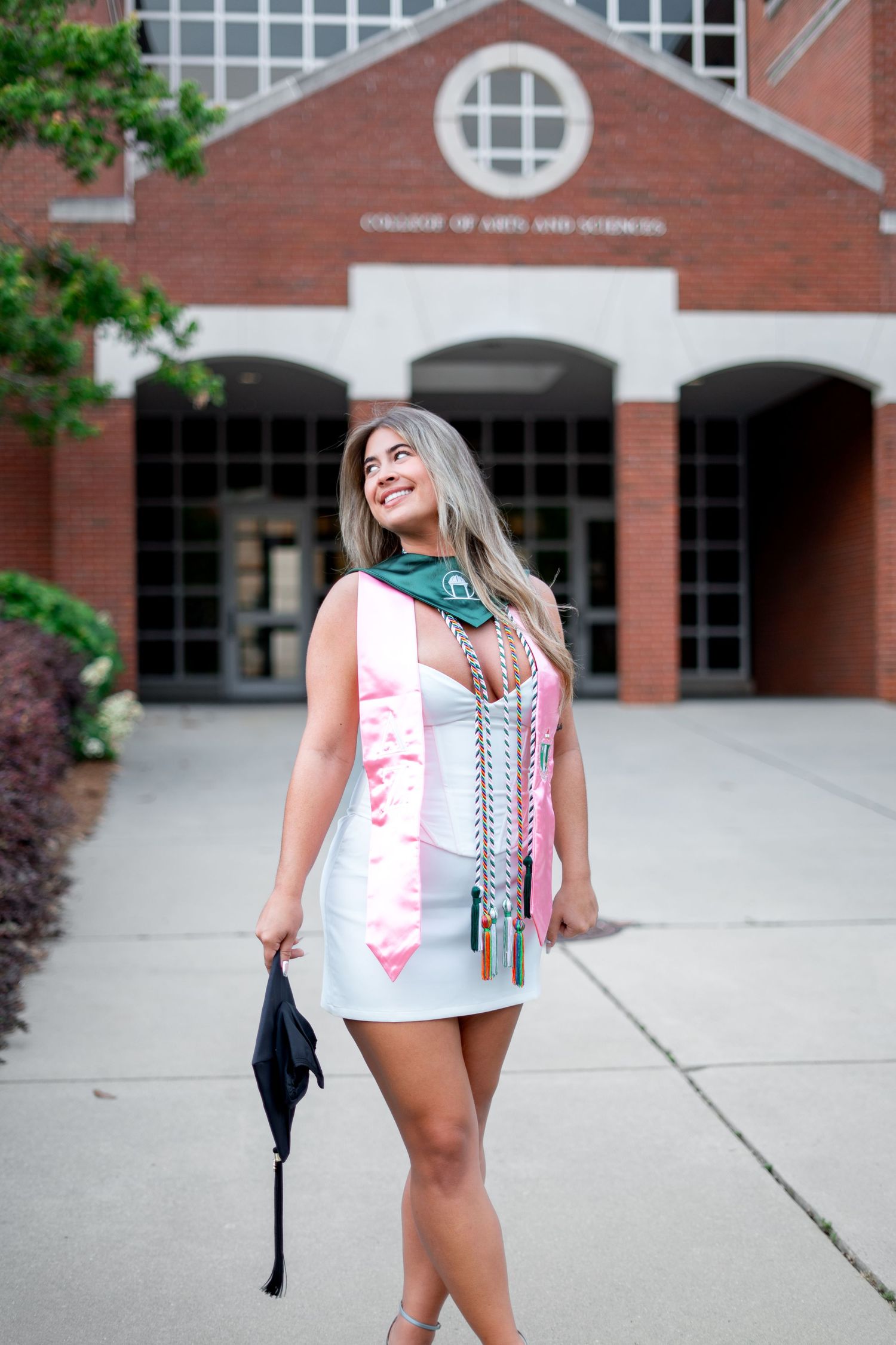 Georgia College graduation photos in front of arts & sciences, one of the best spots on the Milledgeville, georgia campus