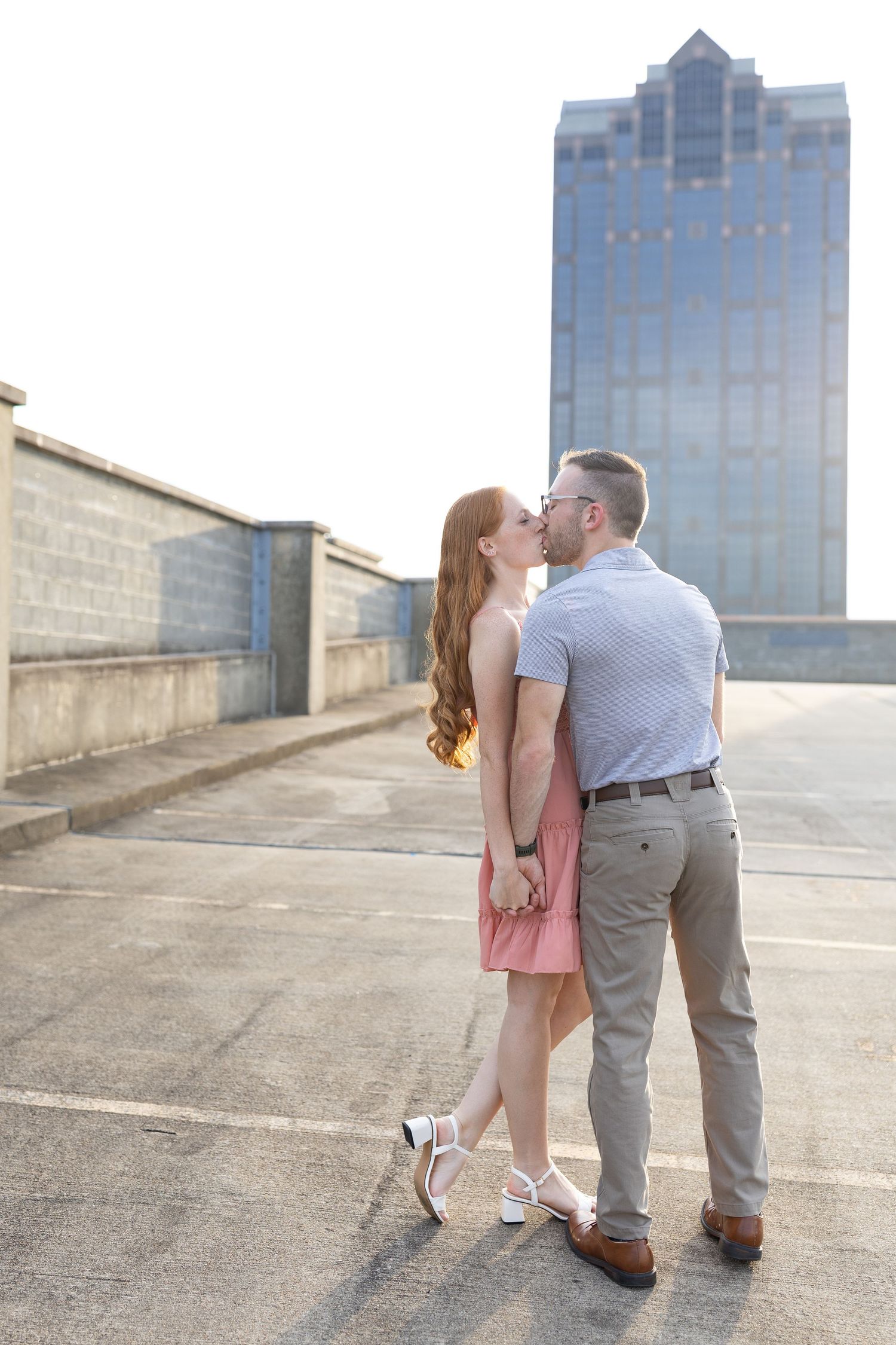 Downtown Raleigh rooftop parking deck engagement photoshoot.