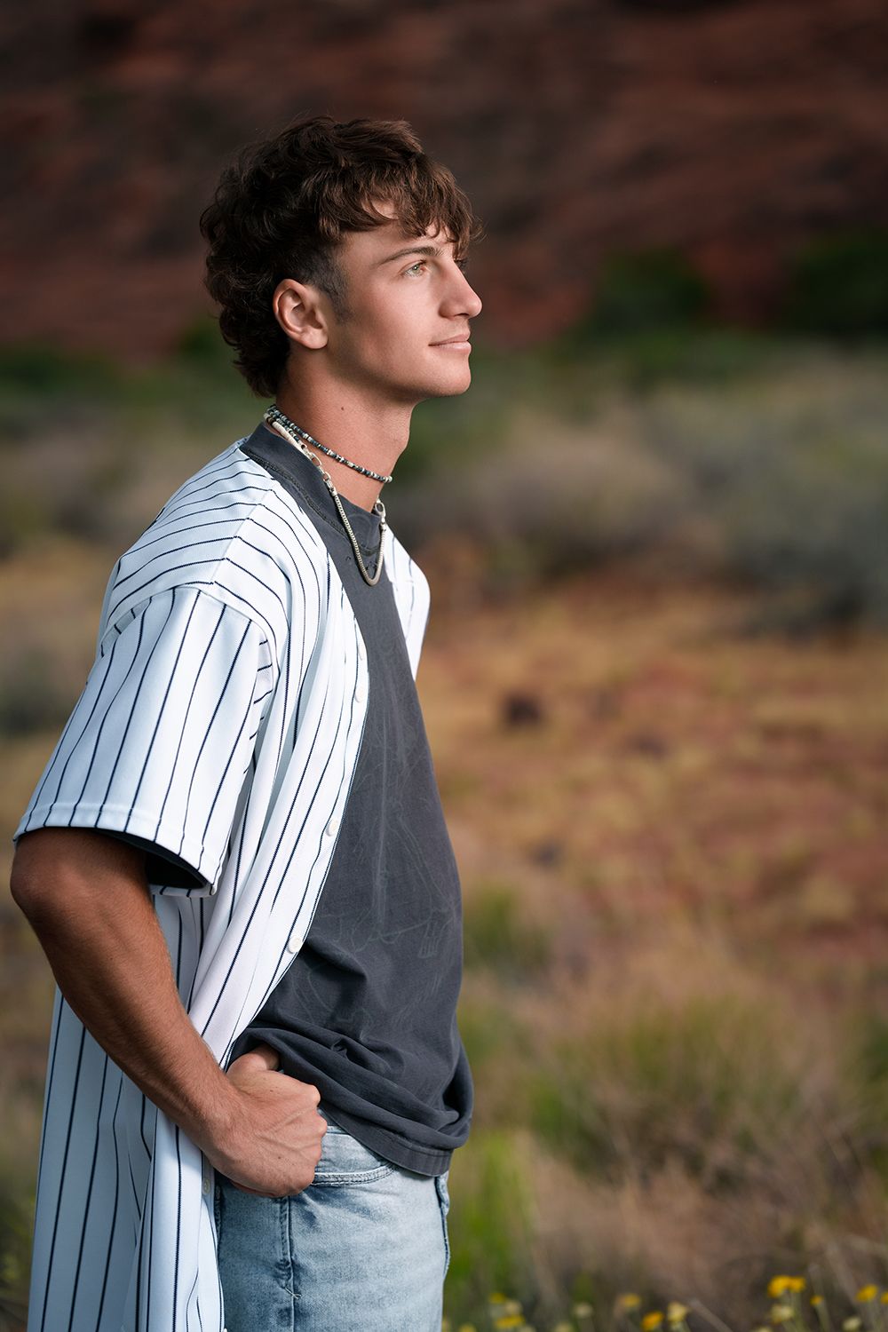 high-school-senior-pics-snow-canyon-baseball-outdoor-class-of-2026-graduation-outdor-scenic-sunset-redrocks-portrait-st-george-utah-vacation
