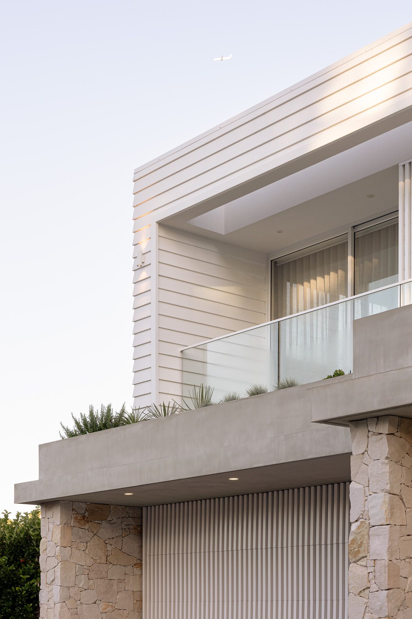 Exterior architectural photography of stone and render facade detailing captured in Port Hacking, Sutherland Shire NSW.