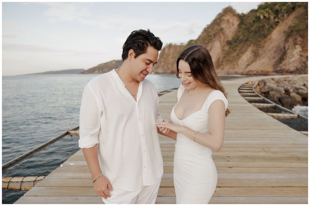 Punta Mita engagement photographer capturing a couple on a pier with engagement photos Punta Mita.