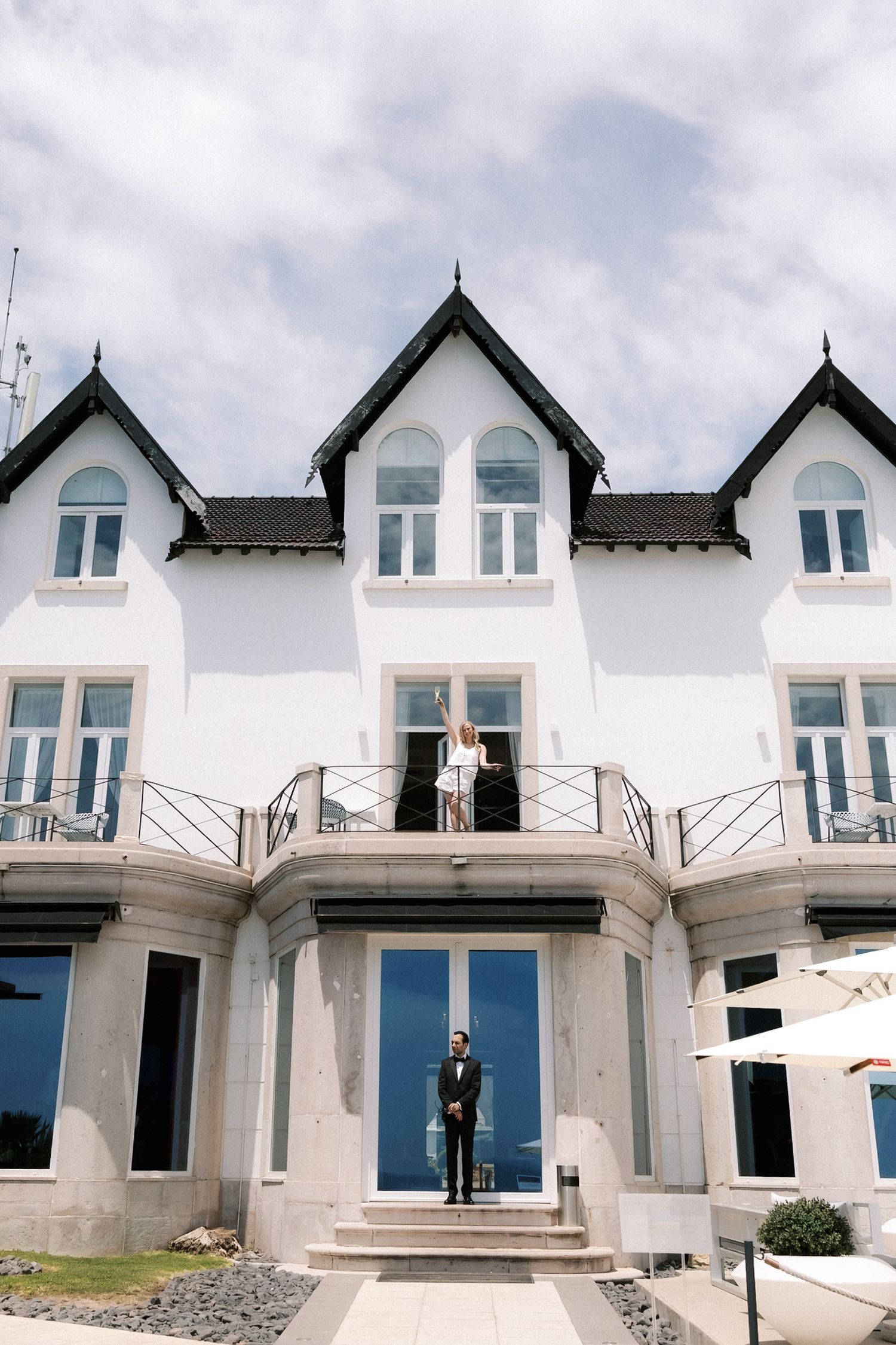Exterior view of Farol Hotel in Cascais, a luxury boutique hotel overlooking the Atlantic Ocean.