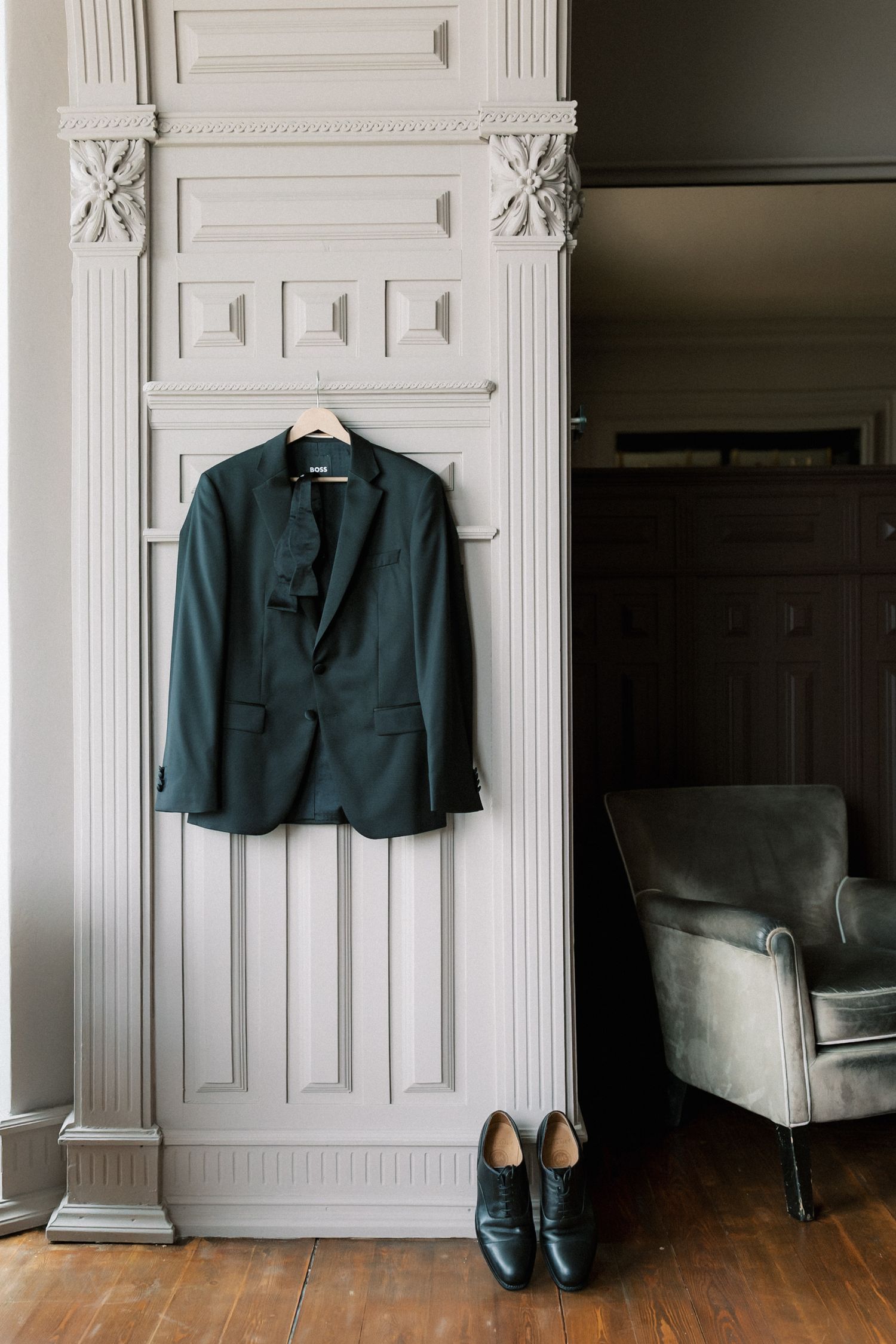 Groom's wedding suit before the destination wedding in Cascais, Portuga
