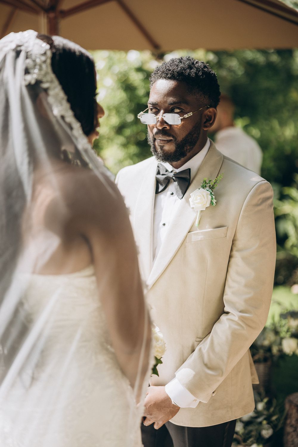 Bride and groom exchanging vows at Can Ribas.