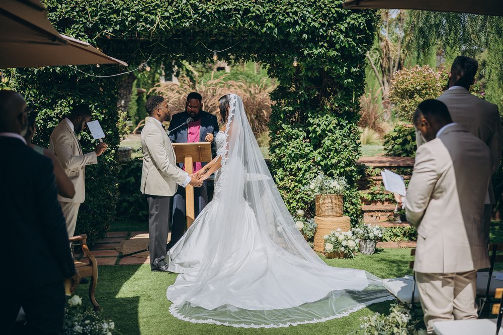 Bride and groom exchanging vows at Can Ribas.
