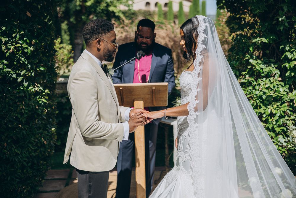 Bride and groom exchanging vows at Can Ribas.