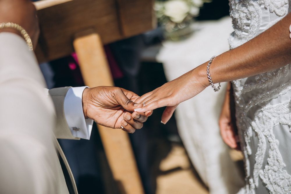 Bride and groom exchanging vows at Can Ribas.
