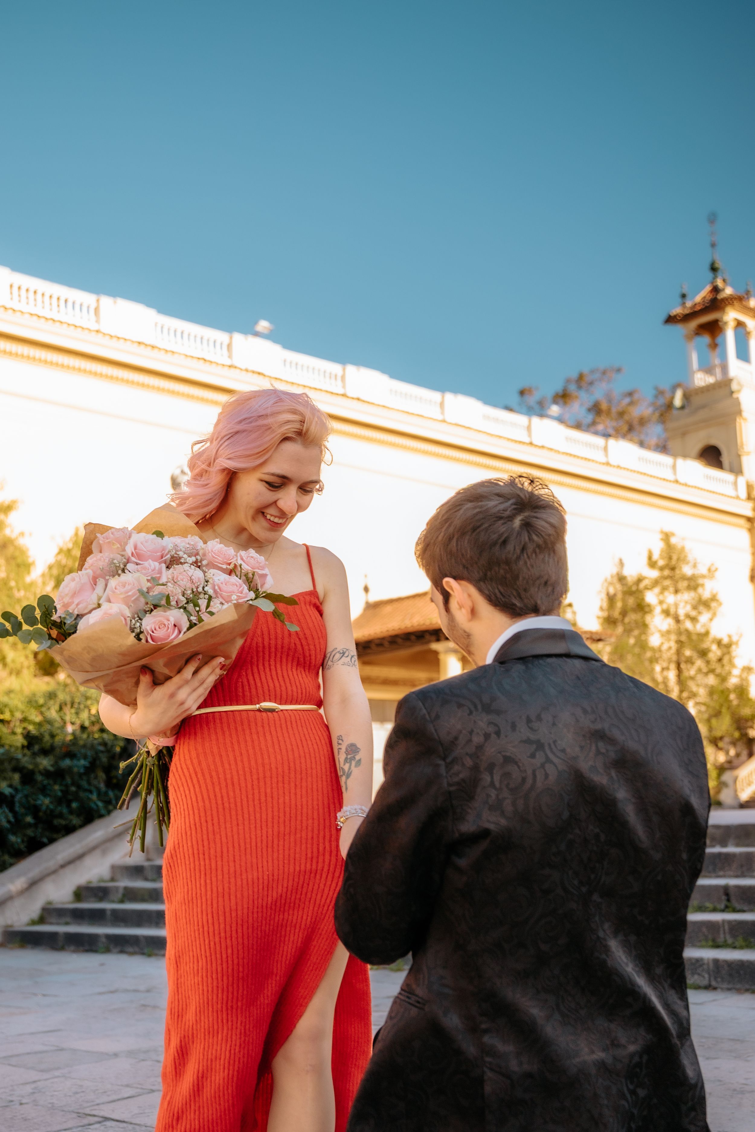 Romantic proposal at the iconic middle plaza overlooking the grand axis of Montjuic fountains.