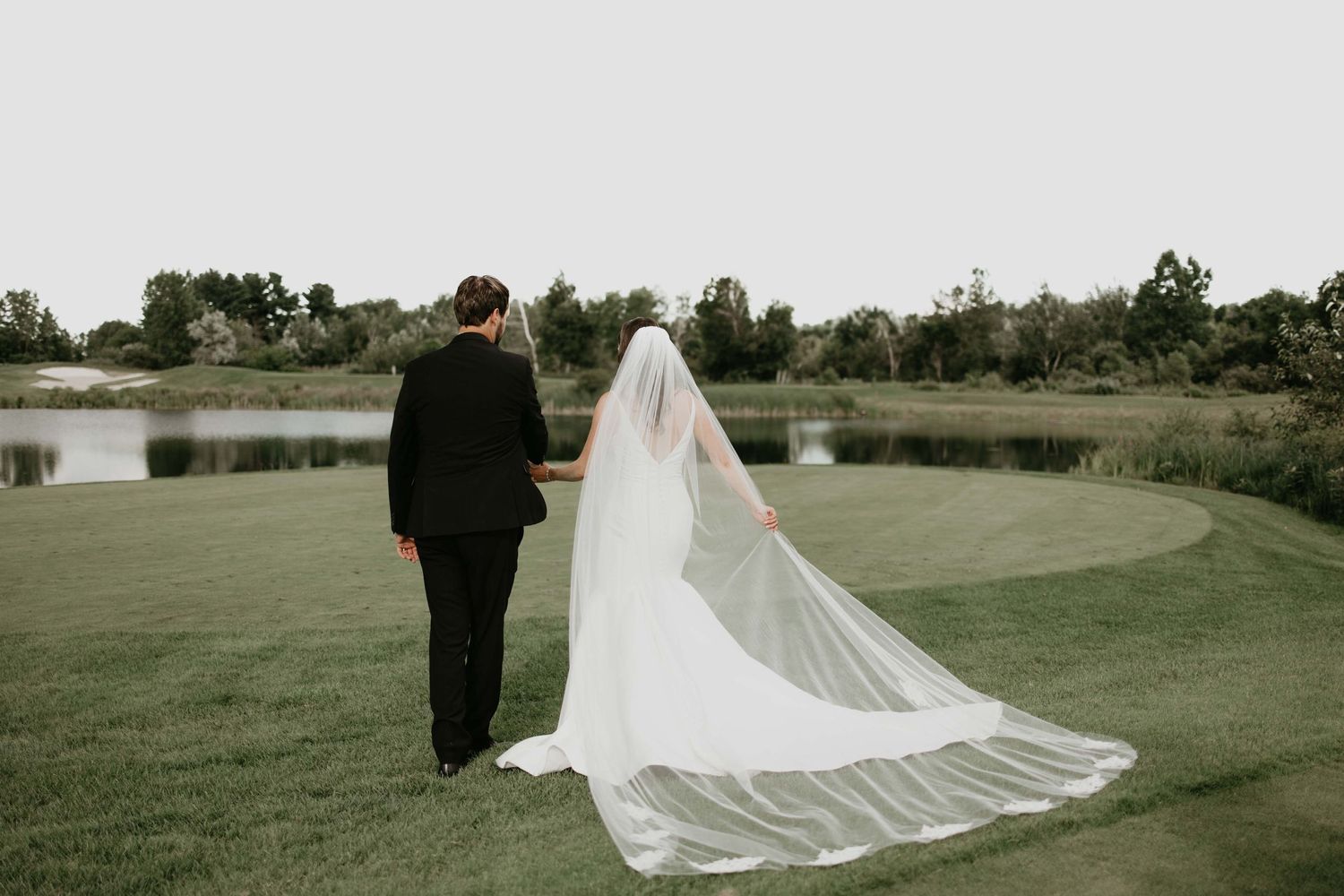 Couple on wedding day on golf course