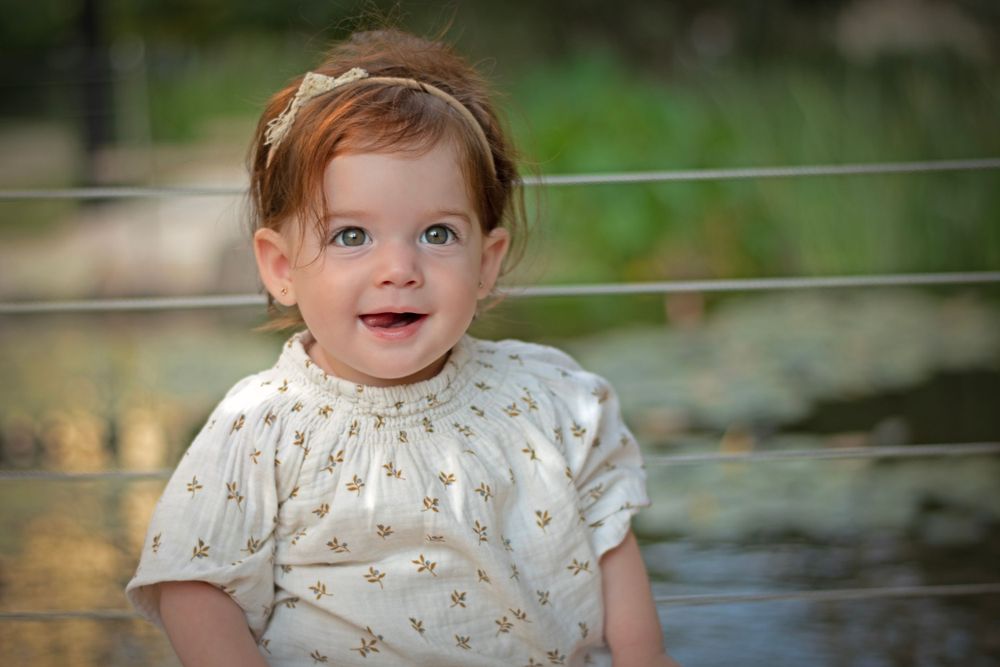 A baby smiling in Yemin Moshe, Jerusalem.