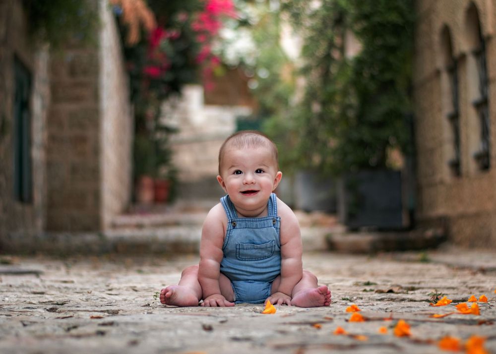 A baby smiling in Yemin Moshe, Jerusalem.