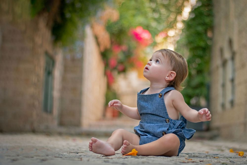 A baby smiling in Yemin Moshe, Jerusalem.