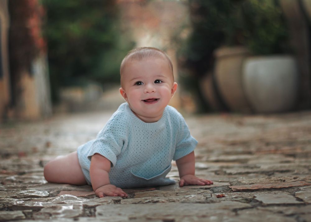 A baby smiling in Yemin Moshe, Jerusalem.