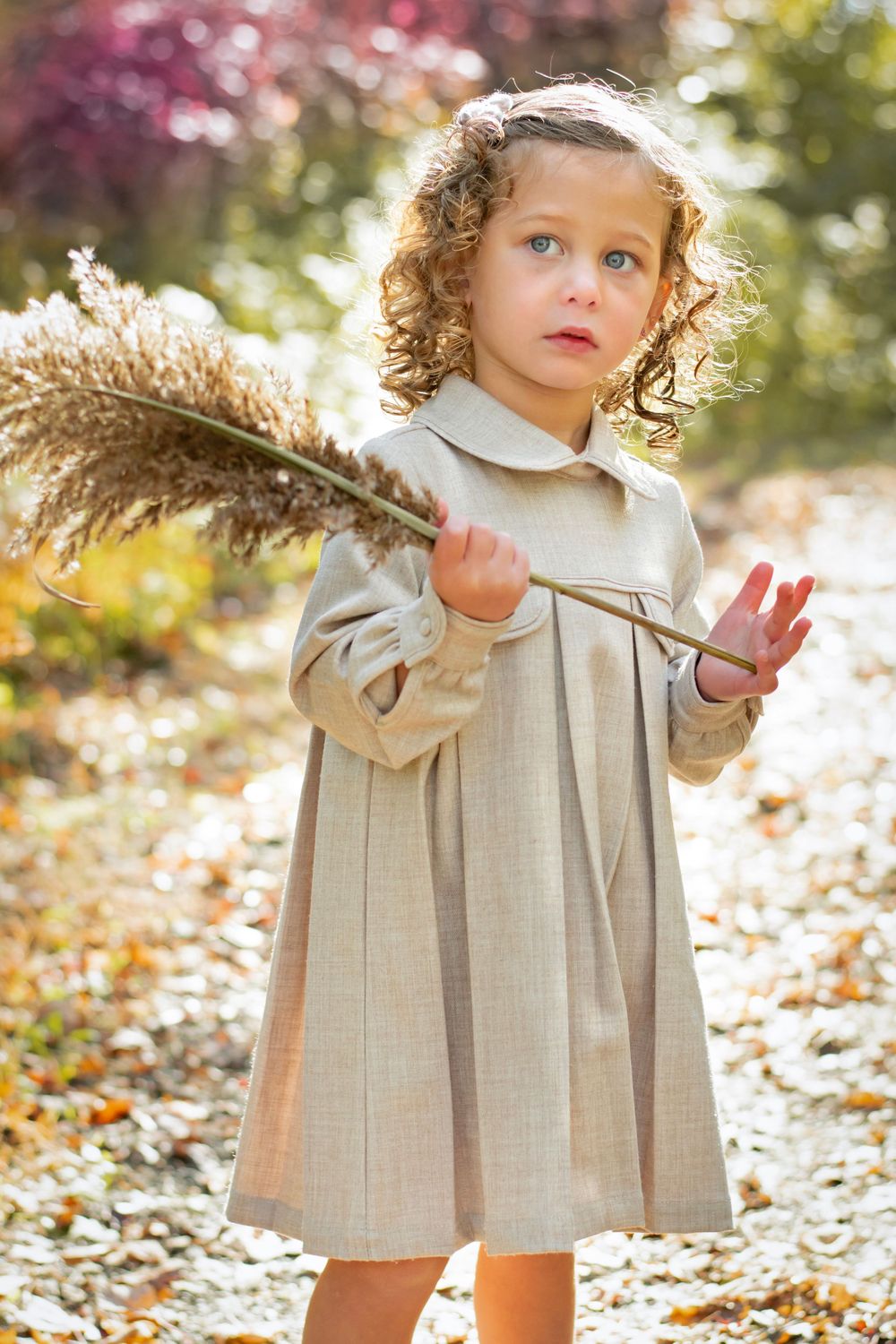 A young girl dreaming amongst the colorful foliage in Lake Shanendoah, Lakewood, new Jersey